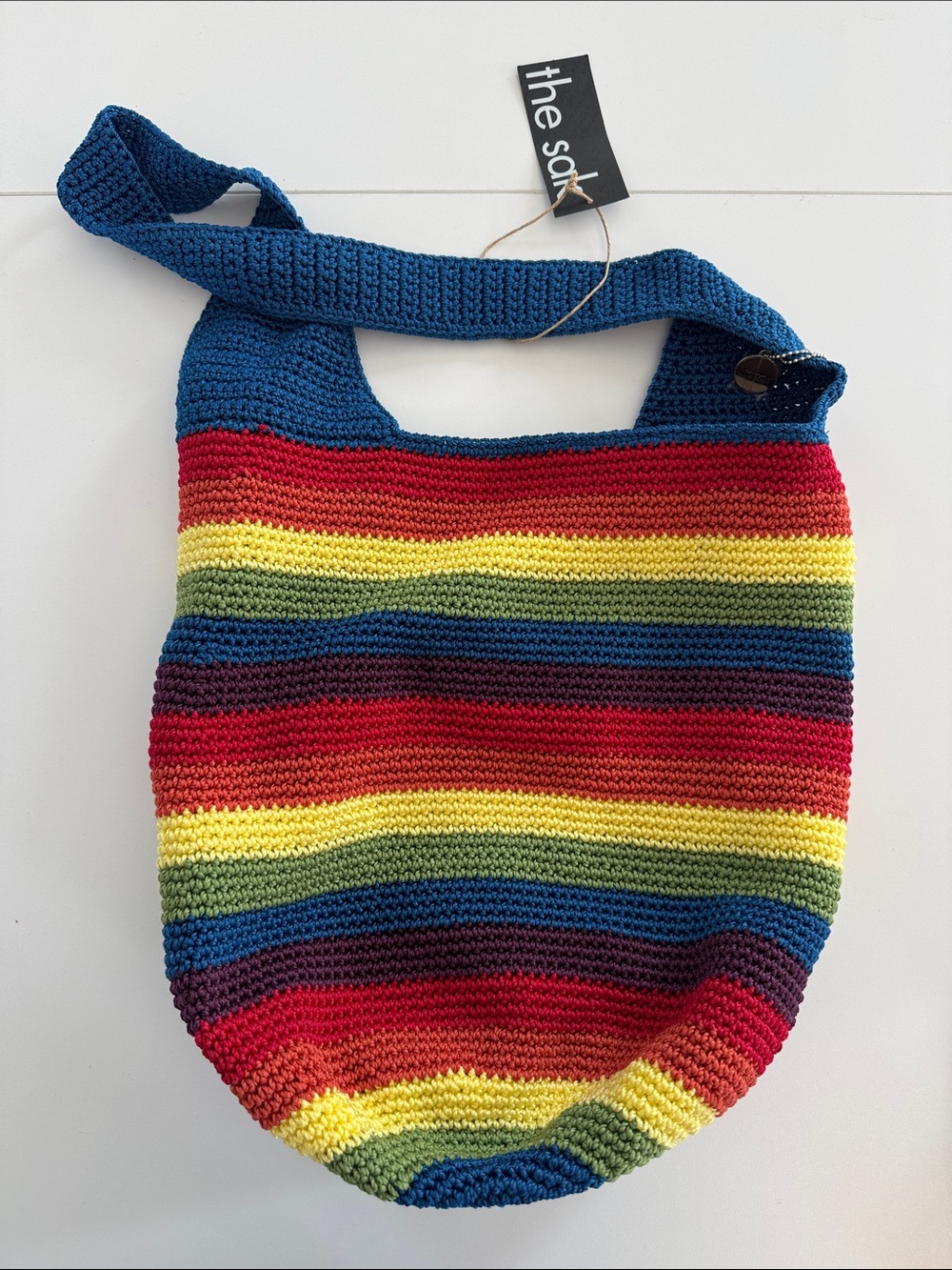 The Sak Crochet Stripe Shoulder Bag in Blue and Rainbow